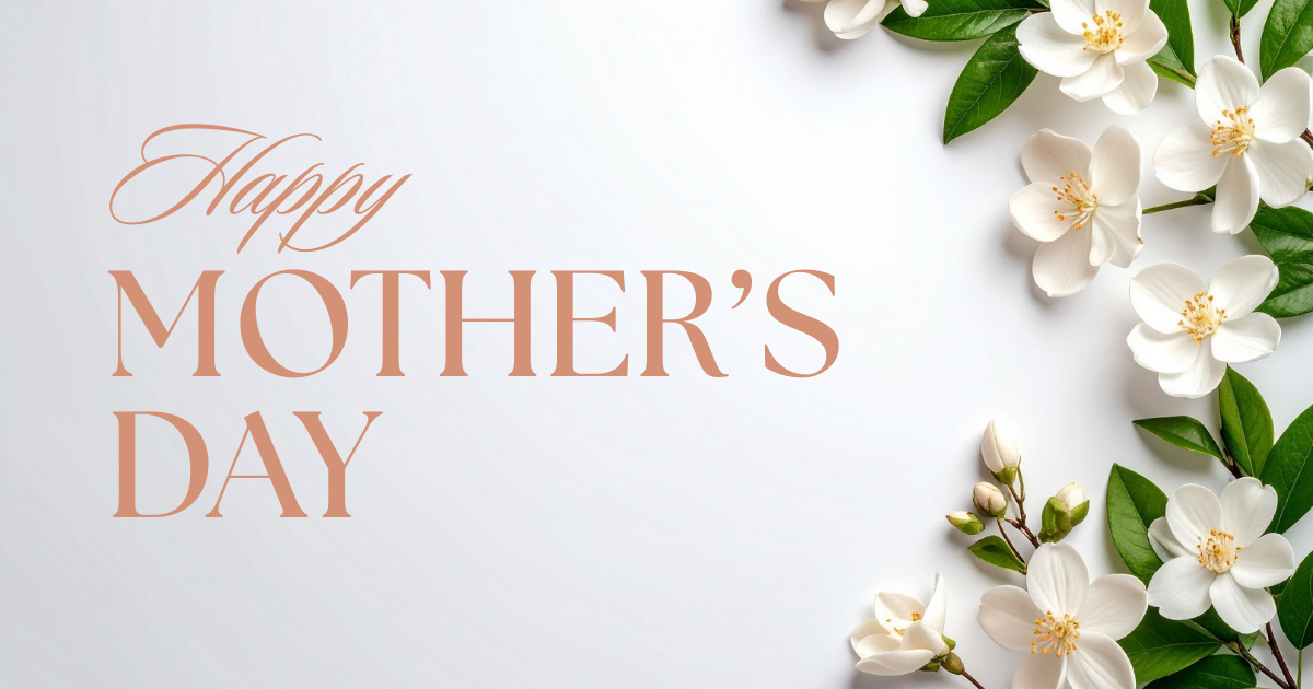 Image of white flowers with the words Happy Mother's Day next the the flowers